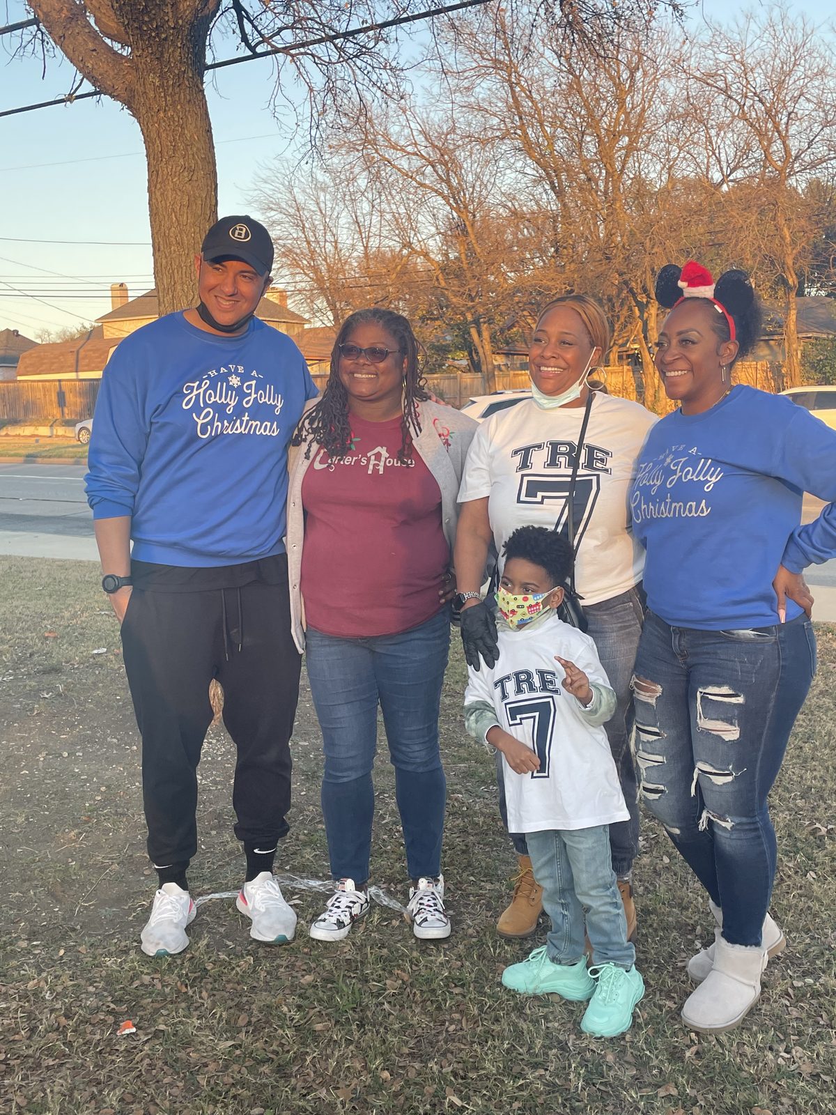 A family at the Holly Jolly event