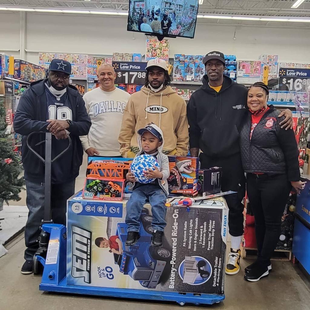 Partners gathering gifts for the giveaway at Walmart